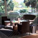 wicker seating on porch overlooking Lake Eulalia in Central Florida