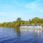 pontoon boat on lake at Blue Spring